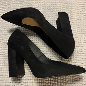 Black Holly pumps that have been worn once
